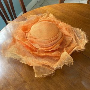 Whimsical tangerine colored straw hat by Petaluma, CA milliner Kate Bishop
